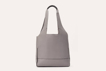 Pink Lucy modern tote bag, stylish accessories with sturdy handles and spacious interior, perfect for everyday use.