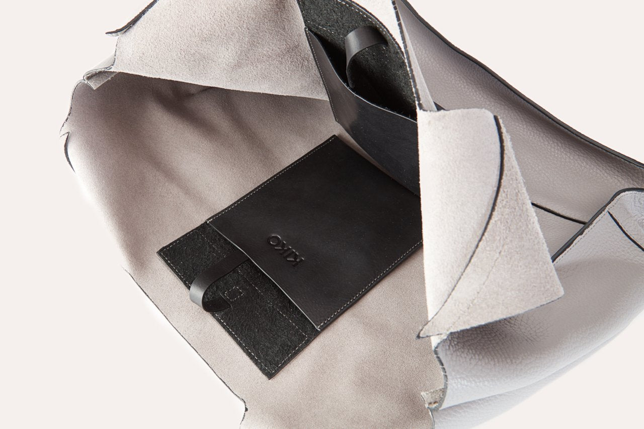 Pink Lucy modern tote bag with sleek design, showing its stylish accessories and spacious interior.