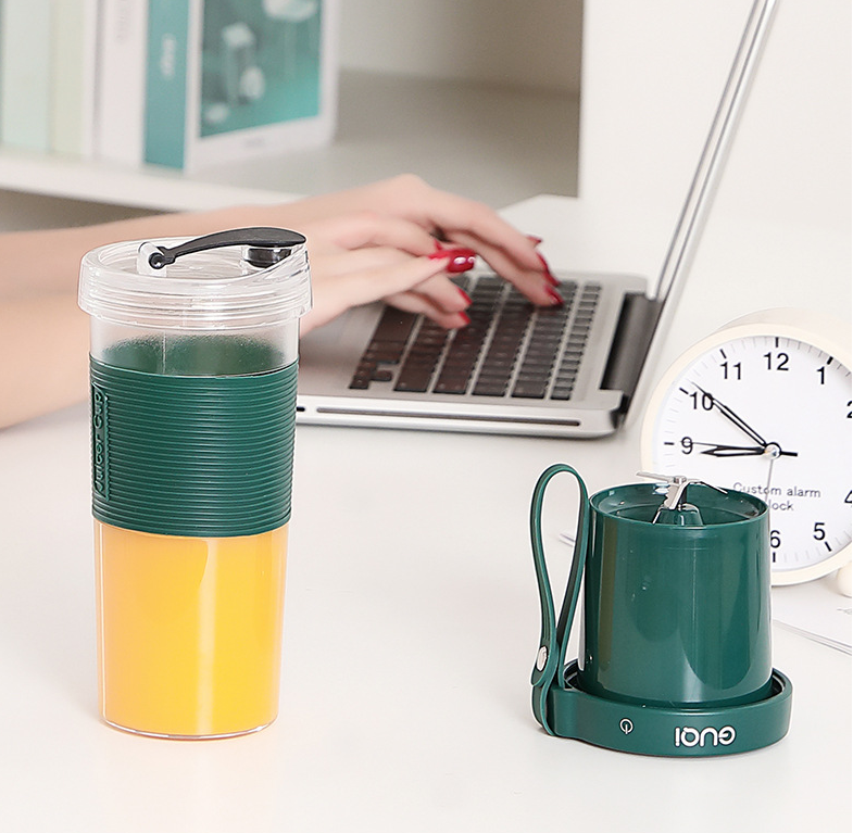 Mini USB rechargeable portable electric fruit juicer by Maroon Asteria, compact kitchen appliance for fresh juice on the go