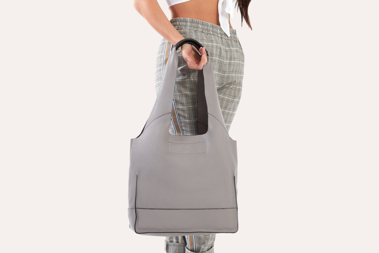 Pink Lucy modern tote bag, stylish accessories with spacious interior and sleek design, perfect for everyday use.