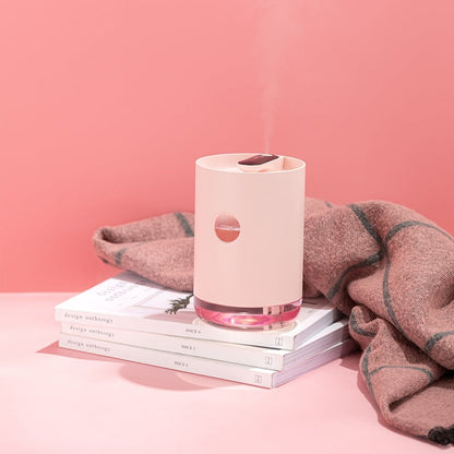 Maroon Asteria portable wireless USB water mist diffuser humidifier for home improvement, showing sleek design and mist output.