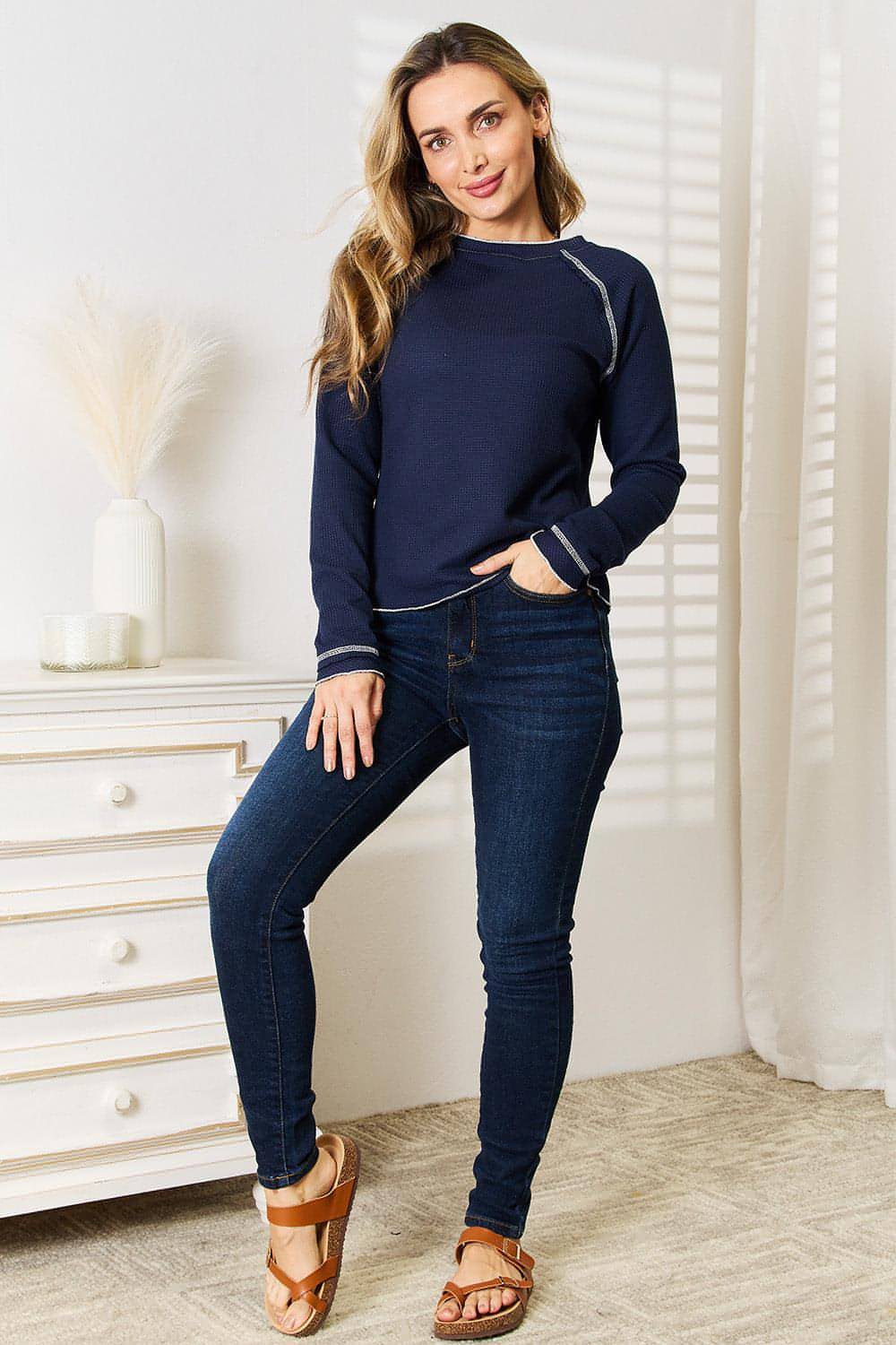 Carmine Juneberry Basic Bae long raglan sleeve round neck top, shown in a casual gift setting, featuring soft fabric and relaxed fit.