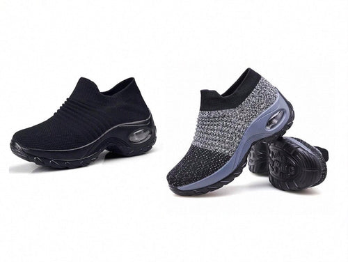 Pair of black dancing shoes from CJDropshipping, featuring flexible soles and stylish design for dance performances.