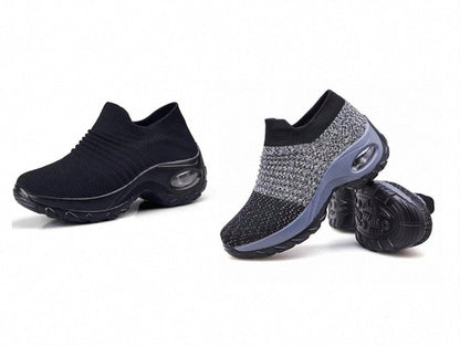 Pair of black dancing shoes from CJDropshipping, featuring flexible soles and stylish design for dance performances.