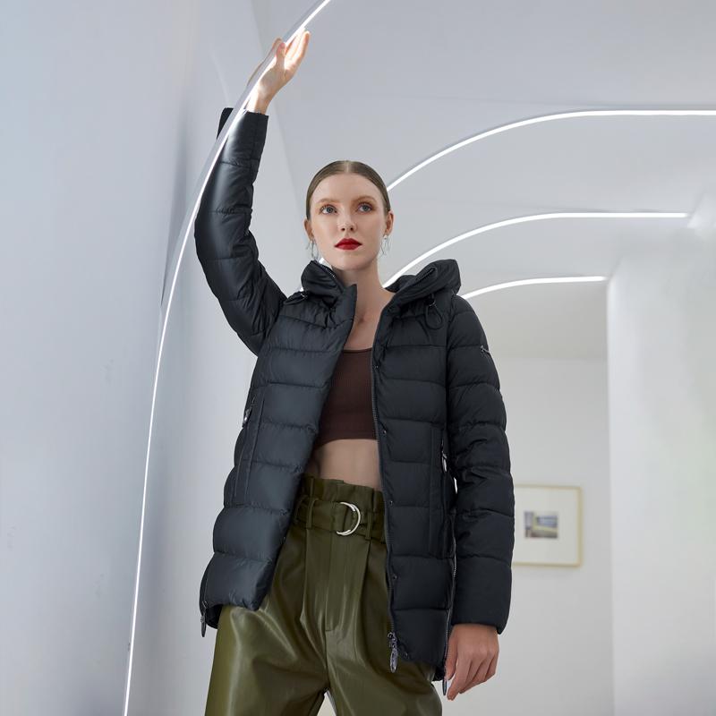 Women’s warm hooded winter coat by Jade, casual jacket with a plush lining and hood, suitable for cold weather.