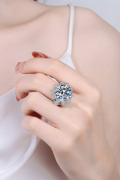 Pear Daisy 10 Carat Moissanite flower-shaped ring with intricate design, showcasing sparkling gemstone and elegant craftsmanship.