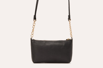 Pink Lucy two-chain crossbody accessory with dual chain straps and compact design, ideal for stylish everyday use.