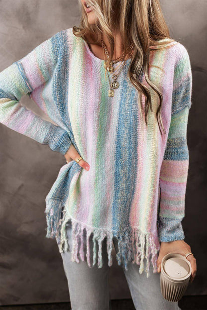 Purple color block fringed drop shoulder sweater from Carmine Juneberry, featuring a cozy, stylish tunic design with fringe details.