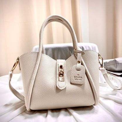 Carmine Juneberry CityEdit™ Litchi Luxe Tote with scarf handle, stylish tote bag with textured finish and elegant scarf accent.