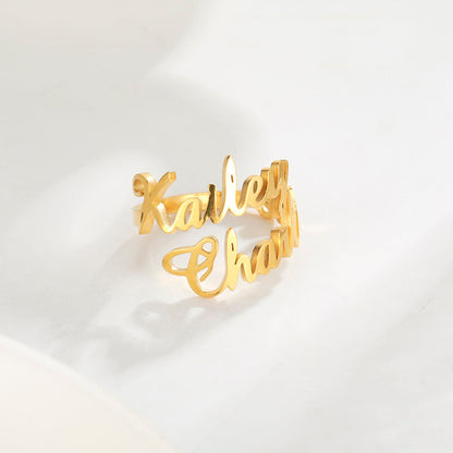 Custom Name Ring from Pink Lucky jewelry featuring a sleek band with personalized engraved name on a stylish jewelry piece.