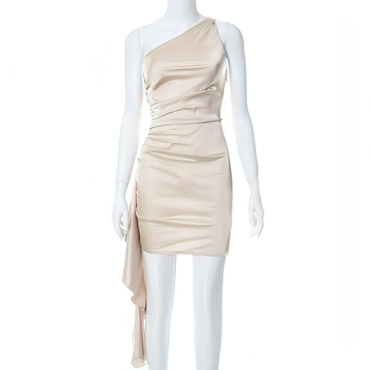 Carmine Juneberry sleeveless slim fit crossbody dress hanging on a mannequin, showcasing a modern, fitted design in a neutral color.