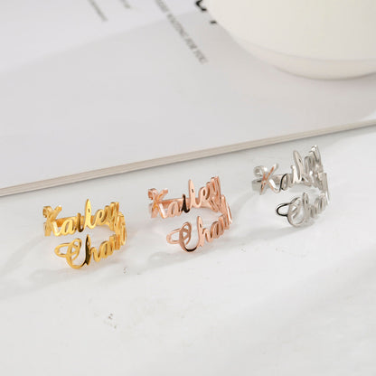 Pink Lucky custom name ring, personalized jewelry with engraved name, featuring a sleek band and elegant design.