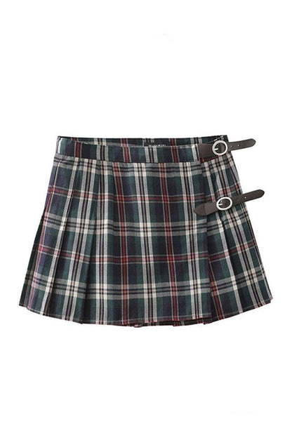 Carmine Juneberry pleated skirt with a flowing, layered design, showcasing soft fabric and a stylish, elegant look.