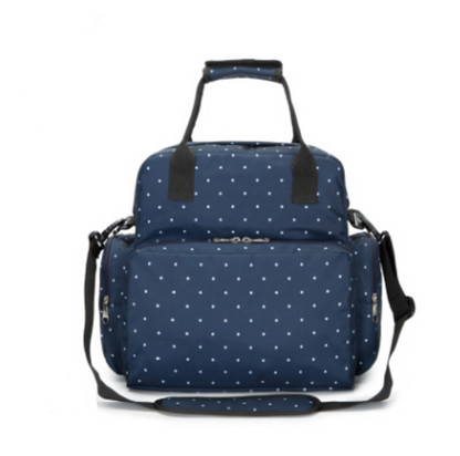 Maroon Asteria diaper mommy bag for travel, featuring multiple compartments and a stylish design for parenthood accessories.