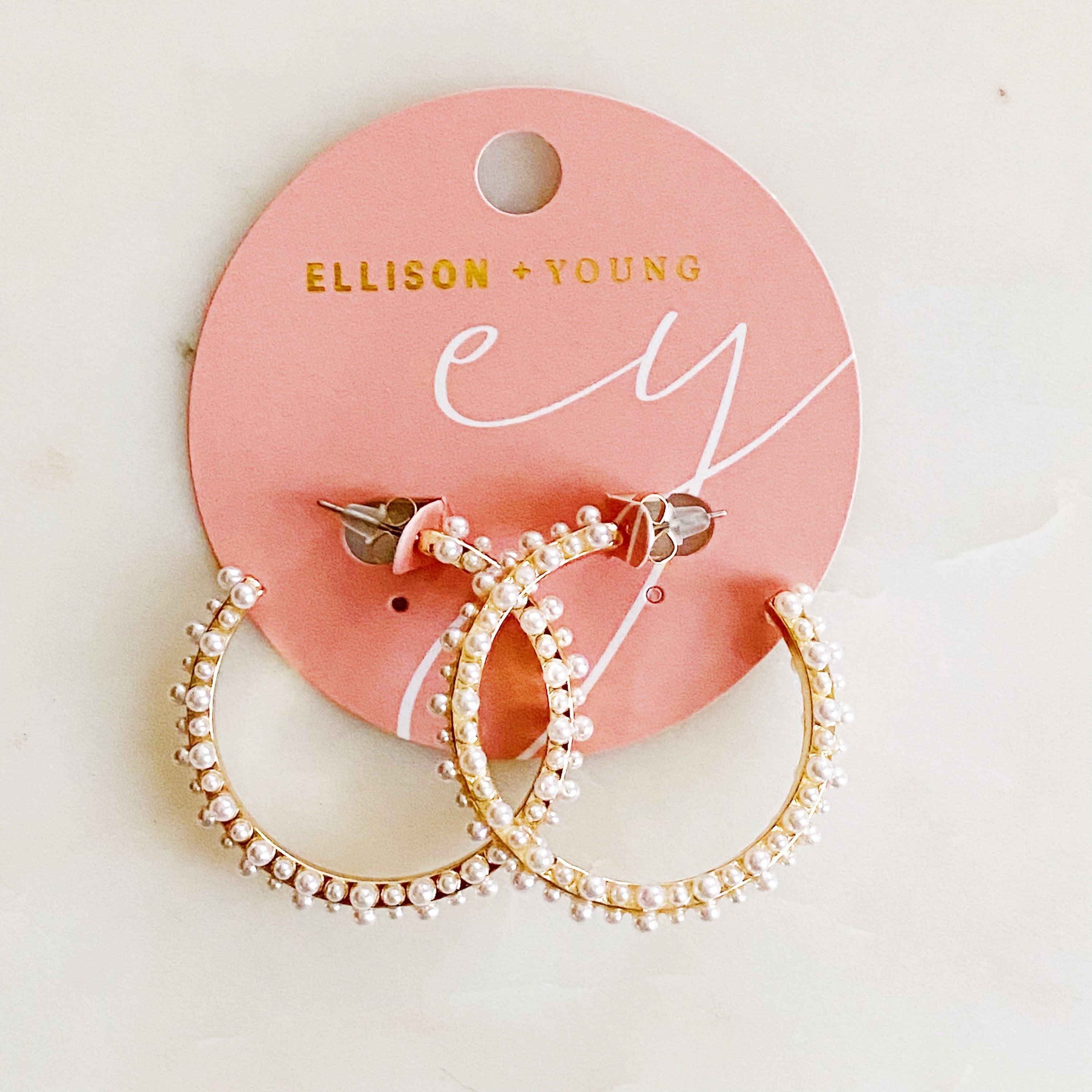 Fuchsia Hercules delicate pearl deco hoop earrings with intricate design, showcasing elegant jewelry craftsmanship.