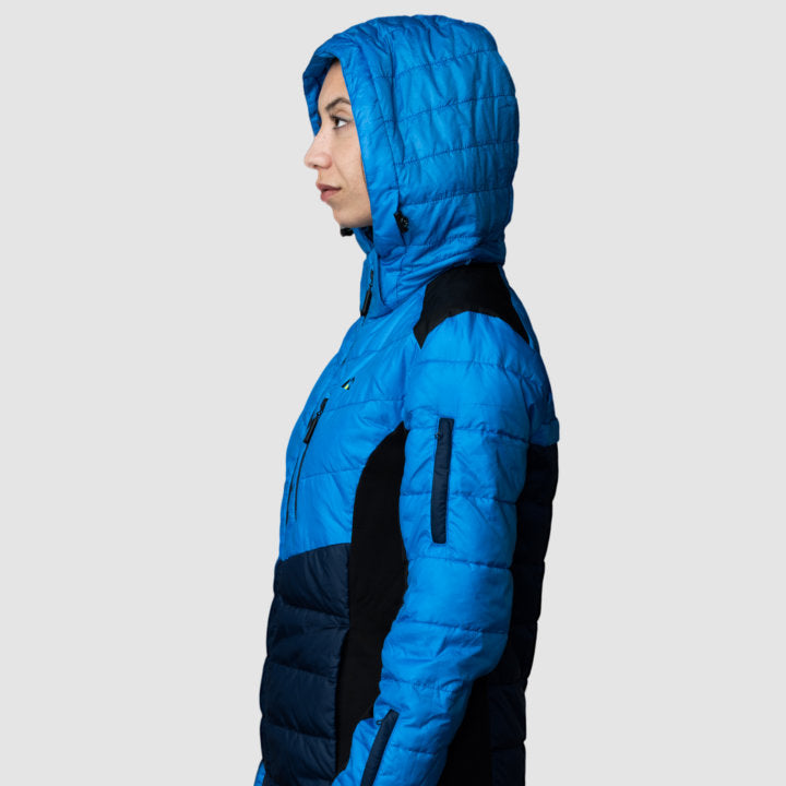 Women’s blue EcoDown activewear jacket by Rose Hemera, lightweight and insulated with a sleek, stylish design.