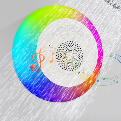 Salmon Lucky Floatilla Bluetooth waterproof LED speaker floating in pool, portable tech accessory with colorful LED lights.