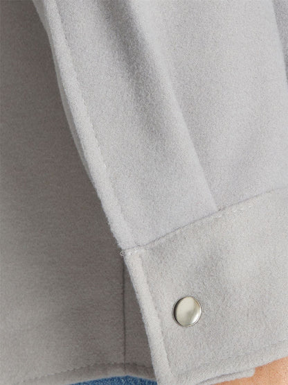 Rose Eleusis oversized patch pocket shacket with a relaxed fit, featuring large patch pockets and a stylish, casual design.