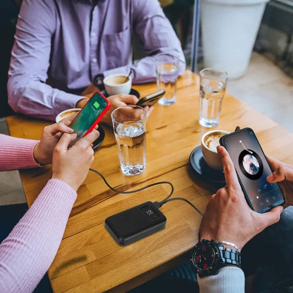 Pear Daisy portable power bank external battery charger with dual USB ports for charging devices on the go.