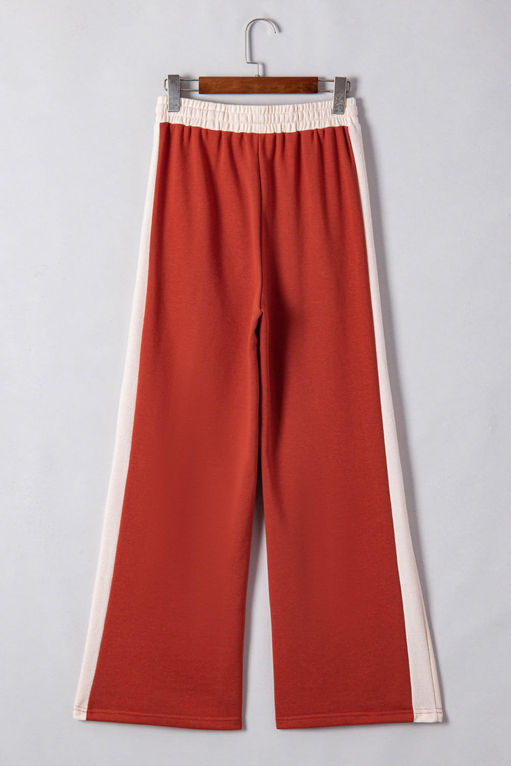 Carmine Juneberry flamingo color block drawstring high waist wide-leg pants, showing the bold design and relaxed fit.
