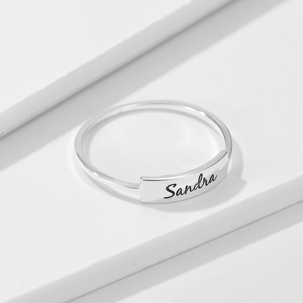 Silver Name-1 ring by Pink Lucky featuring a sleek, polished silver band with engraved personalized name, jewelry and watch accessory