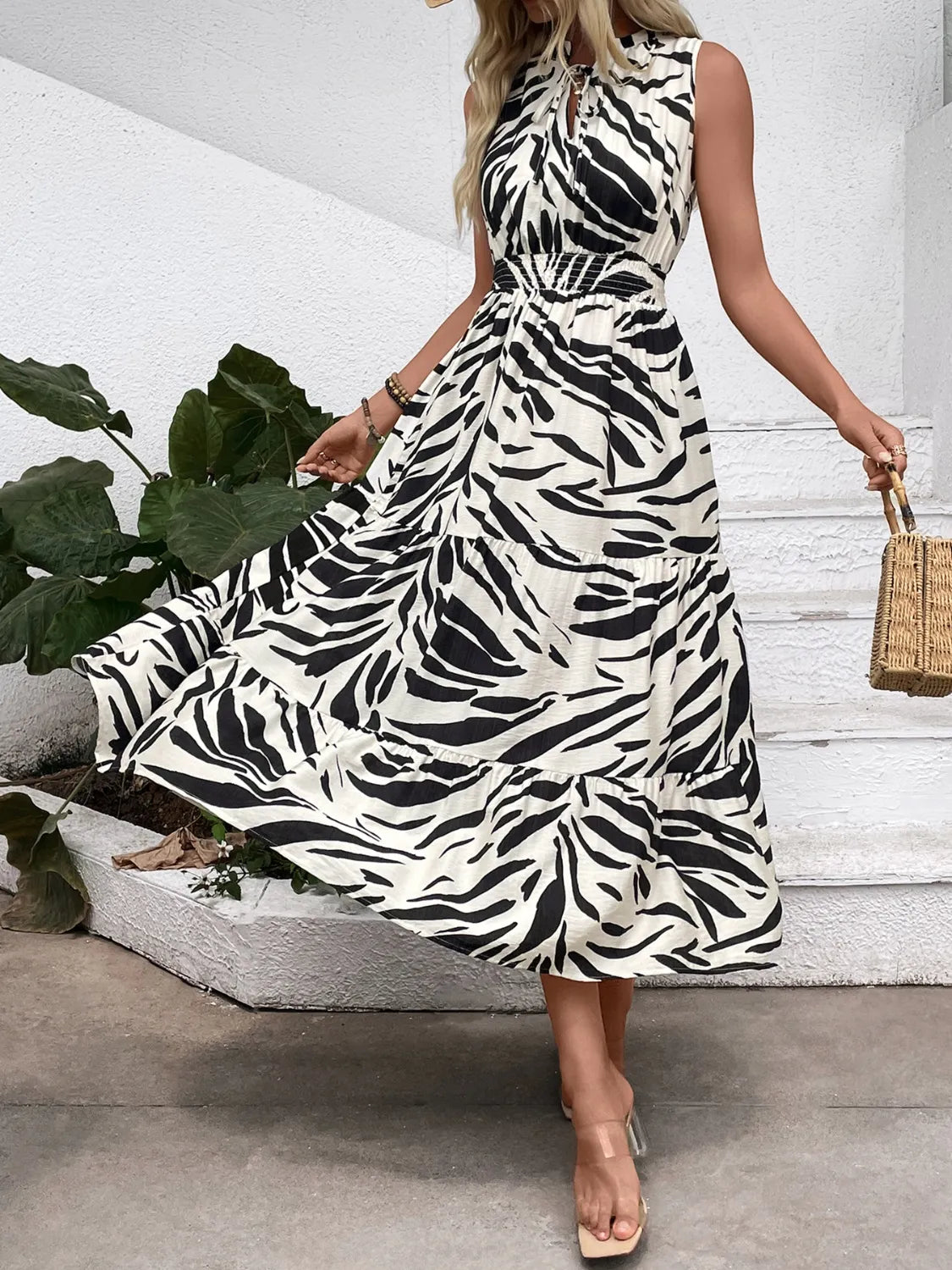 Printed notched sleeveless midi dress by Ruby Styx, featuring a stylish design and comfortable fit for women&