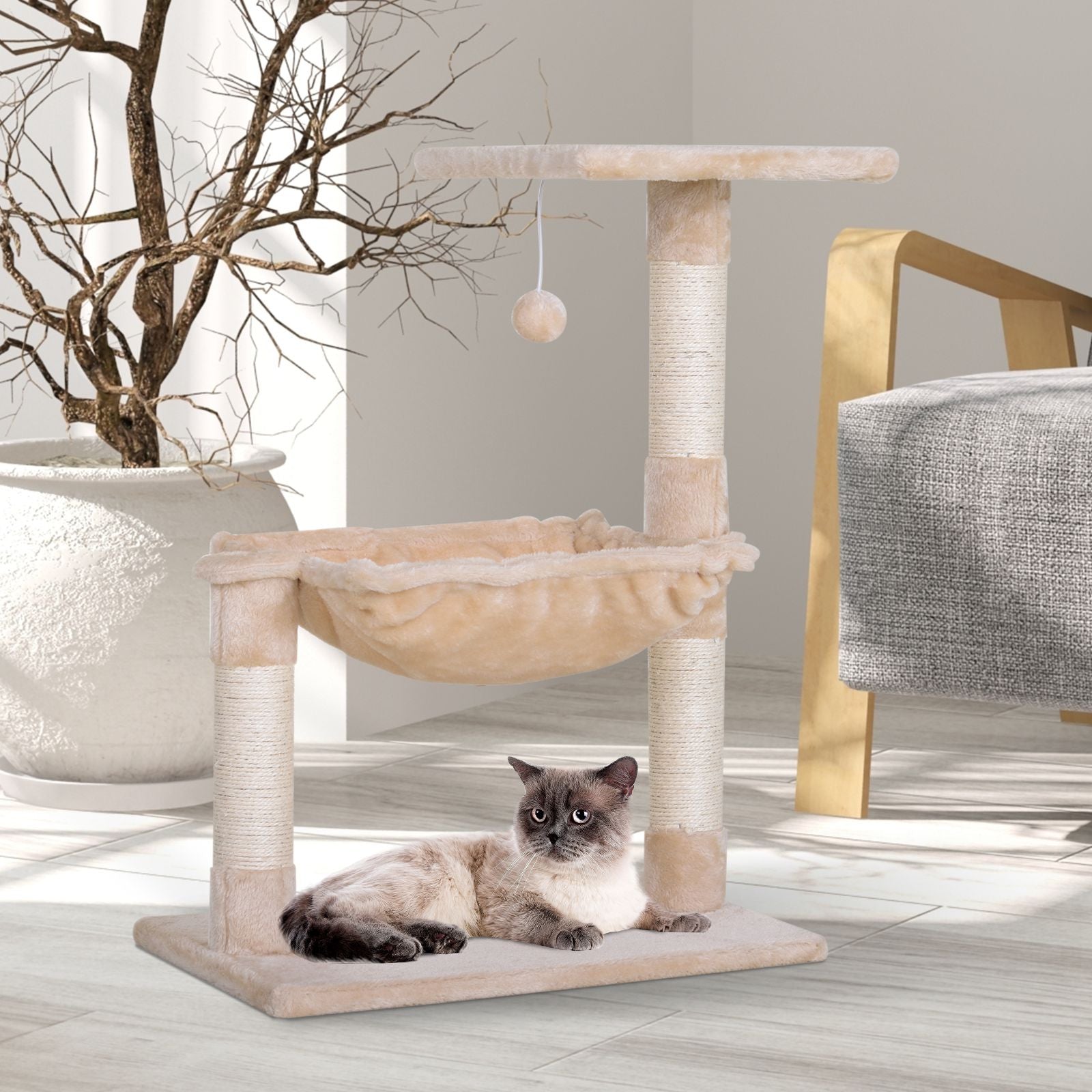 Taupe Shadow PawHut cat tree with hammock and natural sisal scratching post for cats, in a cozy home setting.