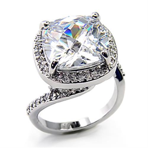 Rhodium brass ring with AAA grade clear CZ by Turquoise Tiger, showcasing a sparkling gemstone and intricate band design.