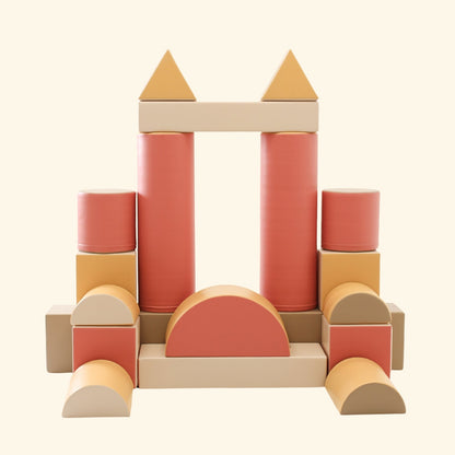 Blush Apricot Mega Fort furniture with colorful fabric panels and soft cushions for indoor play and cozy activities.