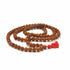 Alabaster Rudraksha natural beads mala with 108 prayer beads, used for meditation and spiritual practices.