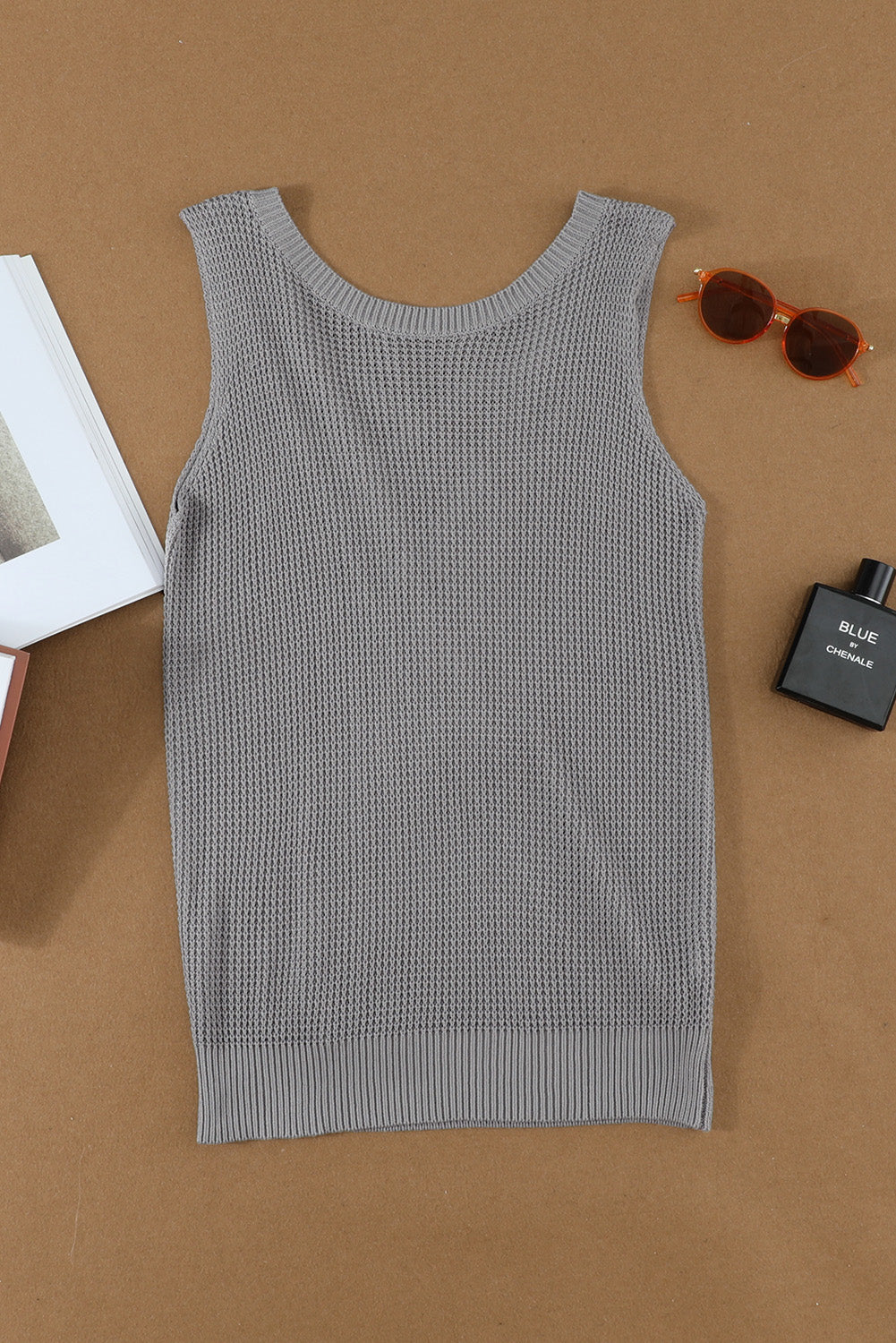 Gray crisscross hollow-out knit tank top for women by Lavender Pallas, featuring a stylish open-knit design and sleeveless fit.