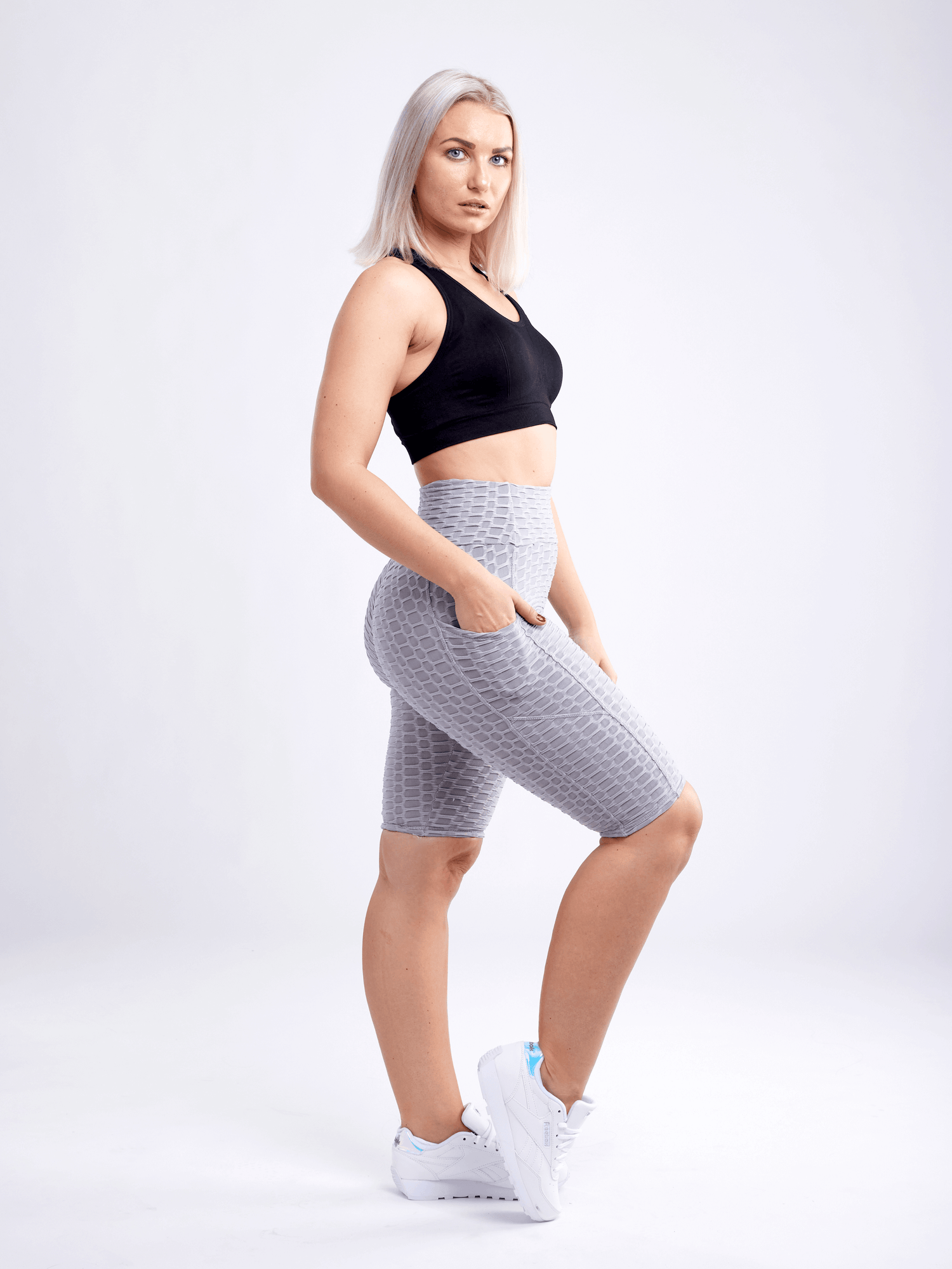 Black Lavender JupiterGear high-waisted scrunch yoga shorts with hip pockets, made for comfortable activewear and flexible movement.