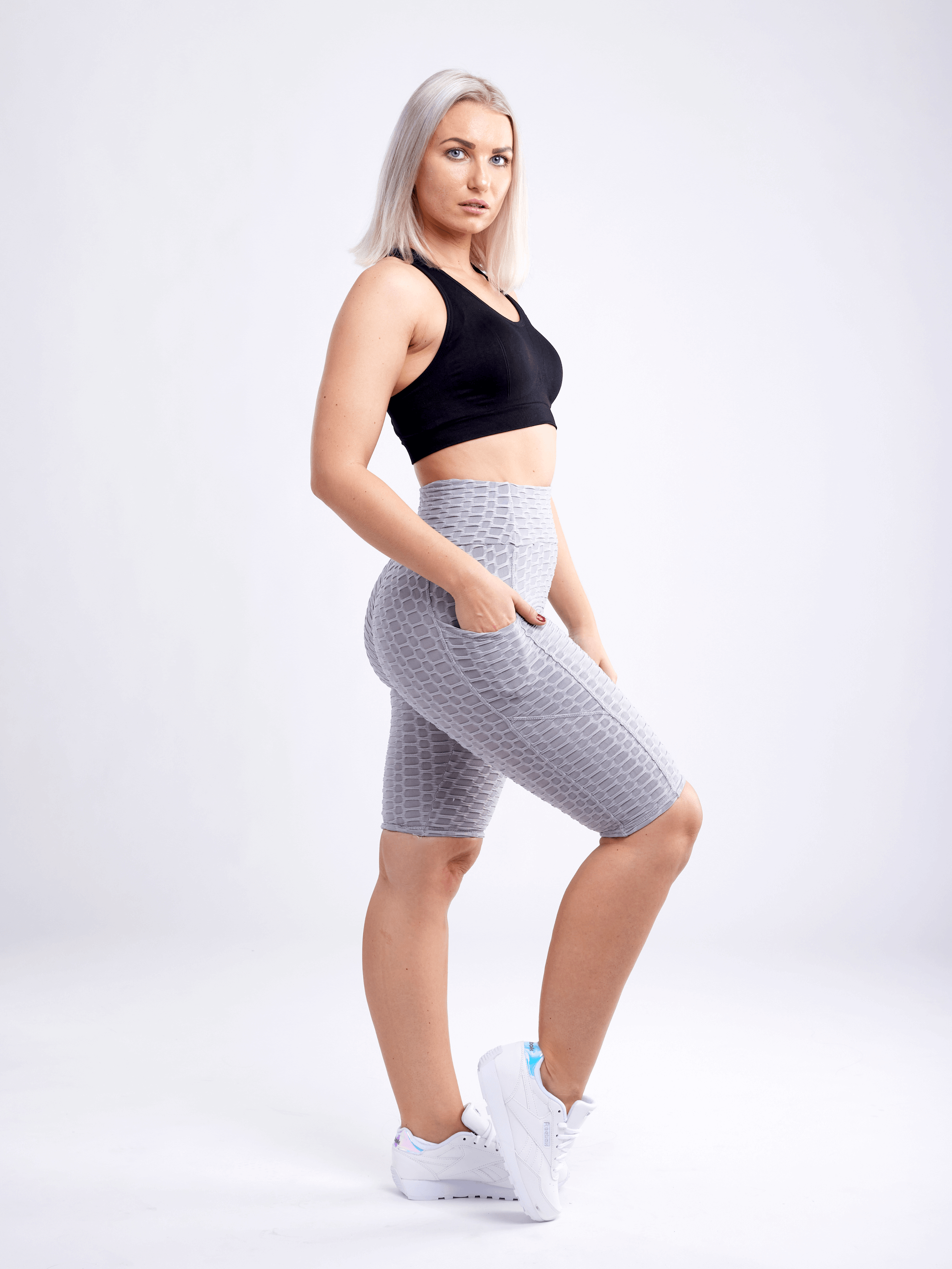 Black Lavender JupiterGear high-waisted scrunch yoga shorts with hip pockets, made for comfortable activewear and flexible movement.