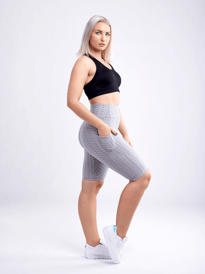 Black Lavender JupiterGear high-waisted scrunch yoga shorts with hip pockets, made for comfortable activewear and flexible movement.
