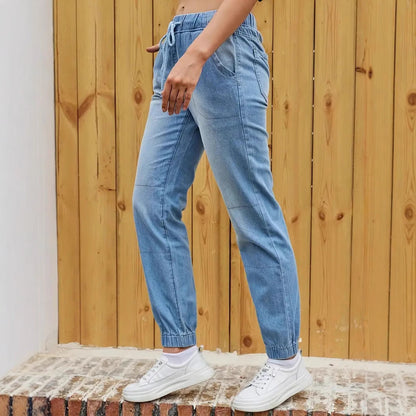 Korean-inspired high waist skinny jeans with elastic waistband from Carmine Juneberry, showcasing a fitted denim look.