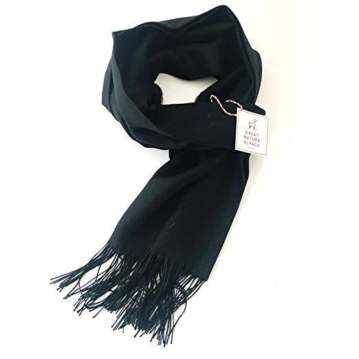 Black Aegerine alpaca and silk shawl featuring a soft, luxurious blend of 70% baby alpaca and 30% silk with fringe detail.