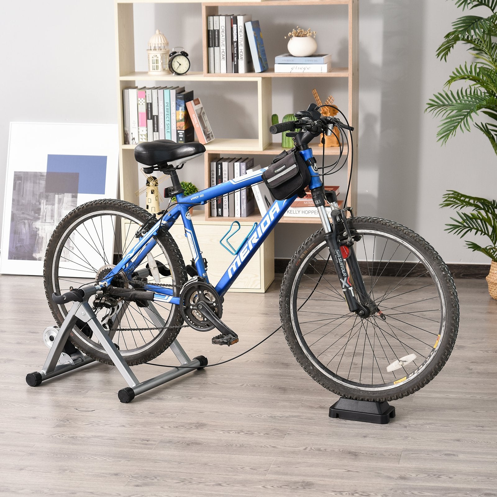 Indoor magnetic bike trainer stand by Taupe Shadow with 5 resistance levels, compatible with exercise bikes for indoor cycling workouts.