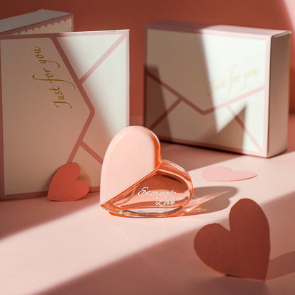 Carmine Juneberry First Love Paris bodycare product with elegant packaging and floral design, showcasing luxurious body scent.