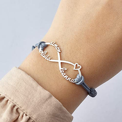 Green Millie mom bracelet with infinity design featuring engraved kids&