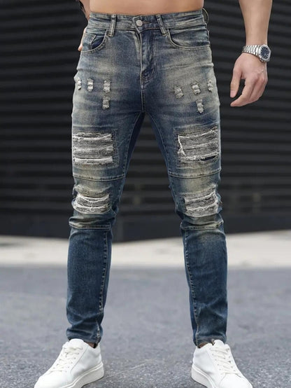 Men’s navy ripped stretch jeans by Carmine Juneberry with distressed details, slim fit, high street style, Urban Cool 25 Edition.