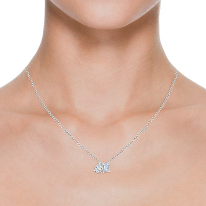 AGI Certified lab-grown emerald-cut and pear diamond two-stone pendant in 14K white gold, featuring 1ctw or 2ctw diamonds.