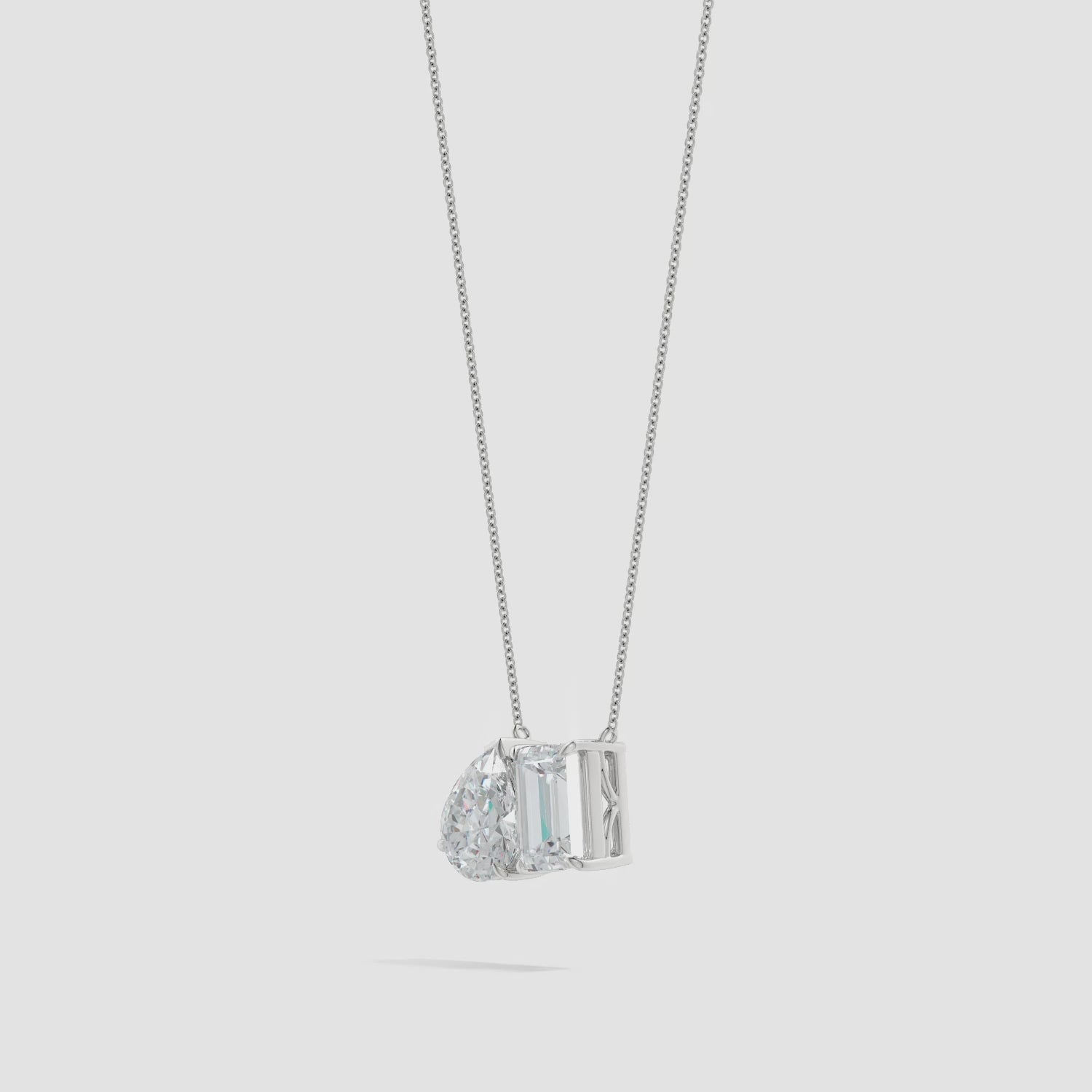 Start2Finish lab-grown emerald-cut and pear diamond two-stone pendant in 14K white gold, featuring 1ctw or 2ctw diamonds.