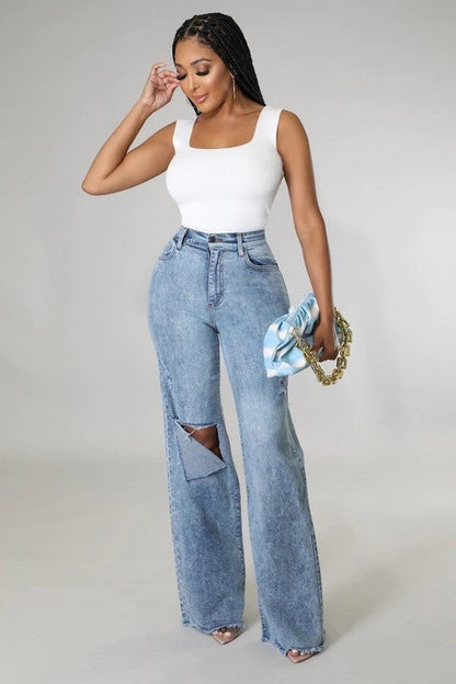 Jade Icarus Tyger Wide Leg Jean automotive part with wide-leg design and durable construction, shown in close-up view.