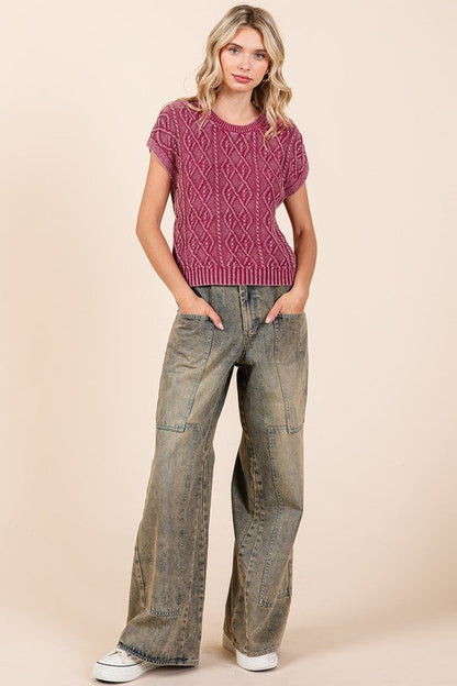Jade Icarus Mittoshop washed wide-leg jeans with pockets, showcasing denim fabric and relaxed fit style.