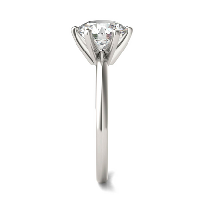 Round lab-grown diamond solitaire engagement ring in 14K white gold with six prongs, G-VS clarity, AGI certified.