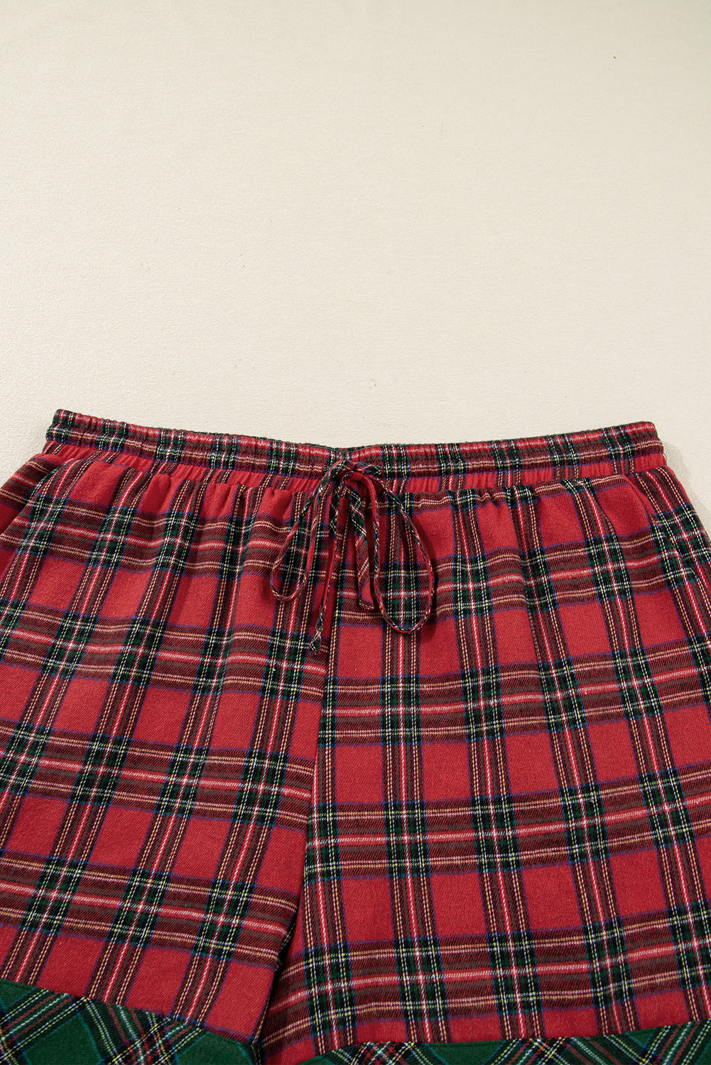 Plus size Christmas plaid pajama set with matching shirt and shorts by Byzantium Bay, cozy holiday sleepwear for women.