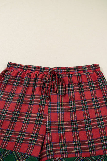 Plus size Christmas plaid pajama set with matching shirt and shorts by Byzantium Bay, cozy holiday sleepwear for women.