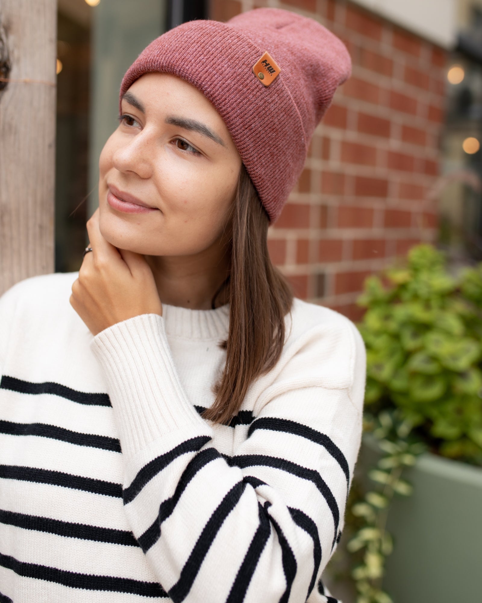 Azure Arrowwood HAAKWEAR Knit Cuffed Beanie in rusty burgundy, warm and cozy hat with a knitted cuff detail.