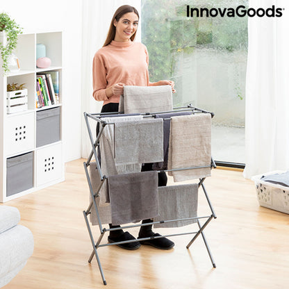 Foldable metal clothes dryer with three extendable levels, ideal for home and garden use by Bigbuy.