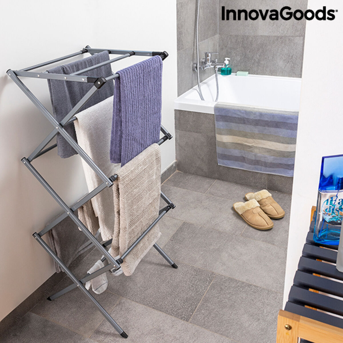 Extendable metal clothes dryer with three levels, foldable design, ideal for home and garden laundry drying.